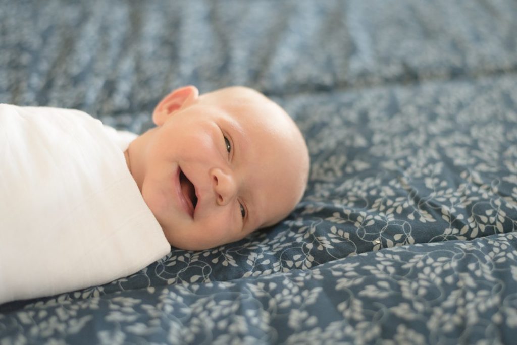 houston newborn photoshoot baby smiling